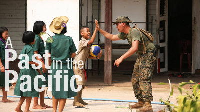 Niti Soonkoontod, left center, a 12-year-old student of the Ban Kuad Nam Man School, and U.S. Marine Lance Cpl. Cuang V. Cao high-five during their lunch break Jan. 24 at Chat Trakarn District, Phitsanulok province, Kingdom of Thailand. Royal Thai soldiers with 302nd Engineer Battalion, Royal Thai Army and U.S. Marines with 9th Engineer Support Battalion, 3rd Marine Logistics Group, III Marine Expeditionary Force, are constructing a new building as part of an ongoing engineering civic assistance project at the school part of exercise Cobra Gold 2013.